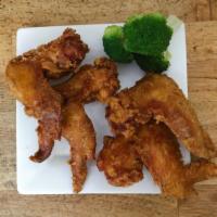 A5. Chicken Wings · Four wings.