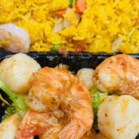 Cajun Scallops Shrimps W.Fried Rich  · Boiled Scallops shrimps broccoli.W Special Cajun Sauce.And choice of Fried Rice.
