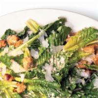Caesar Salad · Green salad with Caesar dressing and cheese. 