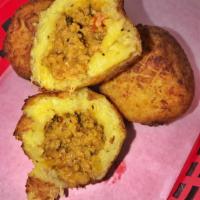 Plantain Balls (Pastelón Balls) · Three fried sweet plantain balls stuffed with savory ground beef. (Tres bolitas de plátano r...