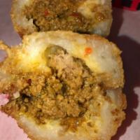 Relleno de Yuca (Stuffed Yuca Ball) · Crispy ball made out of mashed yuca, stuffed with meat.