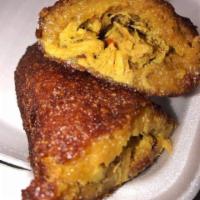 Alcapurria · The Alcapurria is a well-known Puerto Rican fritter or fritura, made of green bananas and ya...