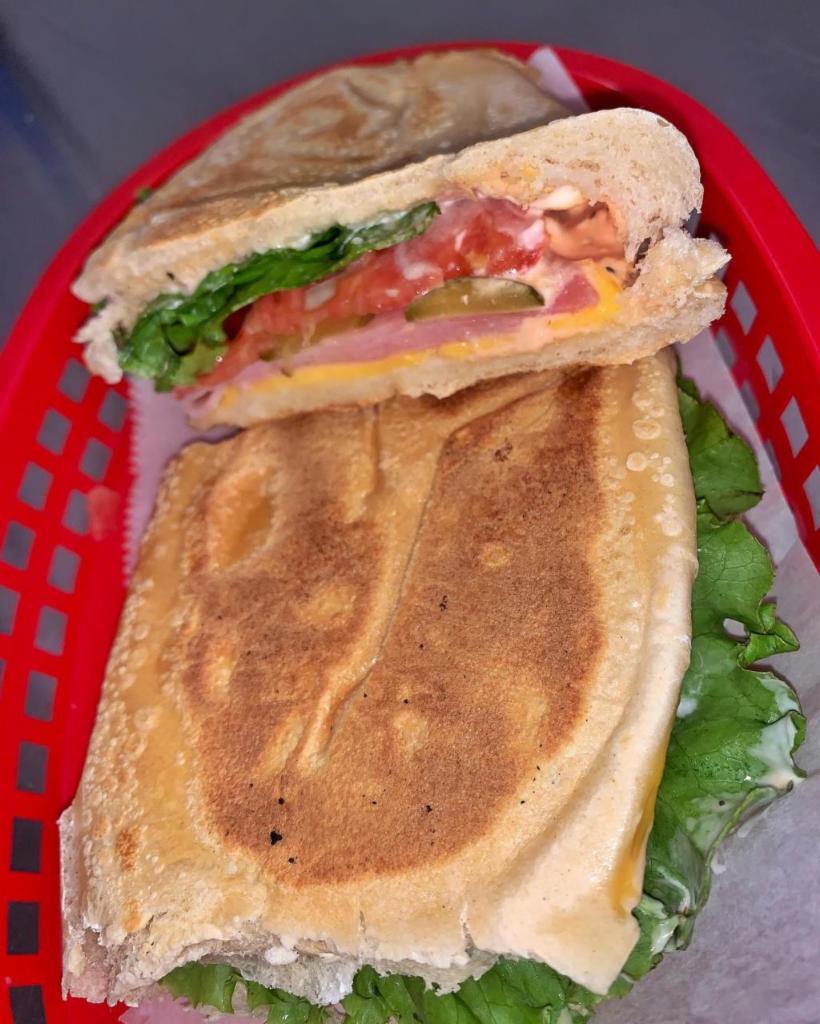 Ham & Cheese (Jamon y queso) Sandwich  · Ham & Cheese on french bread, with your choice of cheese  and toppings.

Add an egg for .50 more! 