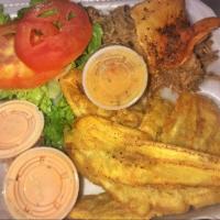 Tostones Meal · Eight fried green plantains, with your choice of meat and a salad. Platanos con su seleccion...