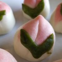 Steamed Lotus Buns · 8 steamed, soft lotus buns filled a sweet red bean paste in the middle. Please allow 30 minu...