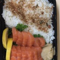Salmon Don · 12 salmon sashimi with sushi rice. Served with miso soup and salad.