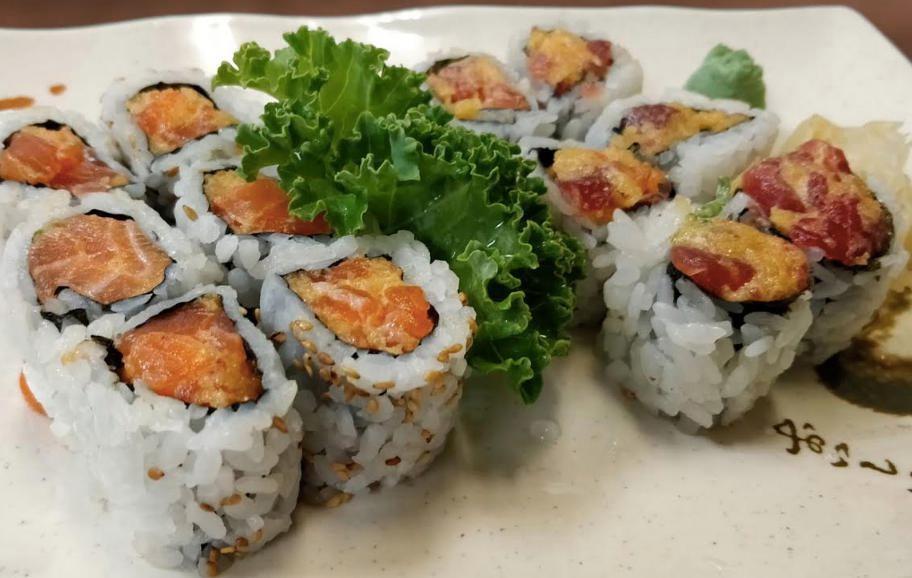 B5. Sushi Box · Spicy Tuna Roll and Spicy Salmon Roll. Served with miso soup.