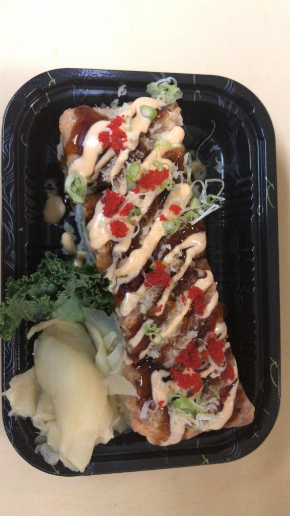 Brooklyn Roll · Shrimp tempura inside, topped with spicy crunchy tuna, tobiko and scallion special sauce.