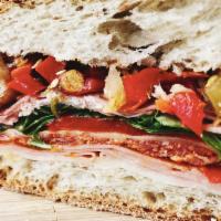 Italian Sub Sandwich · Genoa salami, pepperoni, cappy ham, provolone, lettuce and tomato.