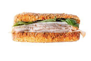 Turkey Club Sandwich · Turkey breast, bacon, lettuce, tomato and mayo.