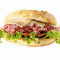 Rare Roast Beef Sandwich · Roast beef, cheddar cheese, red pepper, lettuce, tomato, horseradish.