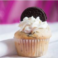 Cookies and Cream Cupcake · Vanilla cupcake baked with chunks of oreo cookie with cream cheese frosting dusted with oreo...
