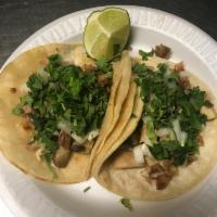 Orden de Tacos · A set of three tacos with the meat of choice. Comes with cilantro and onions. Lime and radis...