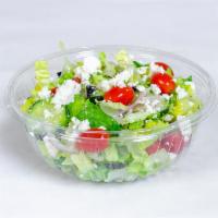 Greek Salad · Romaine lettuce, cherry tomato, cucumber, feta, red onions, black olives, and pepperoncini.