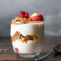 Yogurt Parfait  · Fresh fruit, vanilla yogurt, topped with granola.