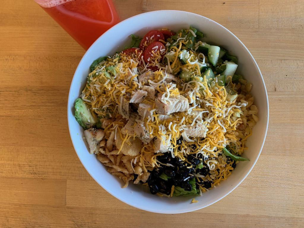 BBQ Chicken Salad  · Romaine, grilled chicken, cucumbers, tomatoes, avocado, black bean corn relish, jack and cheddar cheese, cilantro, fried onions, ranch dressing, and BBQ drizzle. 