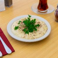 Hummus · Pureed chickpeas with oil and hint of garlic.