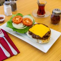 Cheeseburger · Grilled beef patty with lettuce tomatoes, onions, mayonnaise and American cheese.
