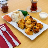 Chicken Shish Kebab · Grilled marinated chicken cube skewers includes blue cheese, ranch, hot sauce or white sauce.