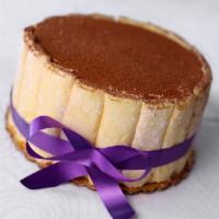 Tiramisu Cake · Sponge soaked in espresso flavored coffee with creamy mascarpone filling and lady fingers ar...