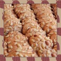 Pignoli Cookies in Box · Traditional almond cookies rolled in mild pine nuts.