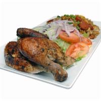 1/2 Pollo con Arroz Frito y Ensalada · 1/2 chicken served with fried rice and salad