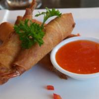 Crispy Shrimp Roll · Deep-fried wrapped shrimp with rice paper and served with plum sauce and sweet chili dipping...
