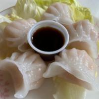 Shrimp Steamed Dumplings · Shrimp Steamed dumpling  served with Thai black soy dipping sauce.