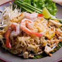 Pad Thai · Thin rice noodles, egg, Thai chive, bean sprouts and roasted peanut with tamarind sauce.