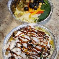 Halal Style Plate · Halal chicken over rice salad, white sauce and hot sauce.