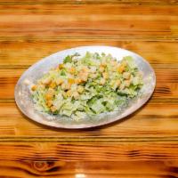 Caesar Salad · Romaine lettuce, croutons and shaved Parmesan.