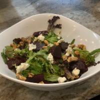 Organic Mixed Greens Salad · Gorgonzola, candied walnuts and beats with balsamic vinaigrette.