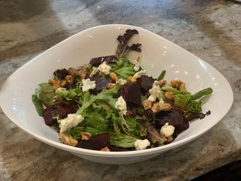 Organic Mixed Greens Salad · Gorgonzola, candied walnuts and beats with balsamic vinaigrette.