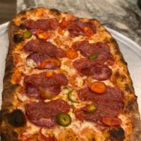 Diabolo Pizza · Tomato sauce, mozzarella, hot capicola, hot sopressata and hot cherry peppers.