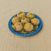 Sev Puri · Deep fried hollow puri filled with a mixture of sprouts (moong), onion, sweet, garlic and sp...