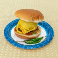 Vada Pav · Deep fried spiced mashed potato balls dipped in chickpea batter placed inside a bread bun (P...