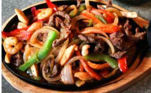 Bistec Fajita · Steak. Sauteed onions, bell peppers, cilantro. Served with rice and beans and tortillas.