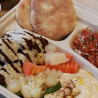 Taamia Platter · Our Famous Egyptian Falafel, Hummus, Egyptian Salata Baladi, assorted pickles and 3 mini pit...