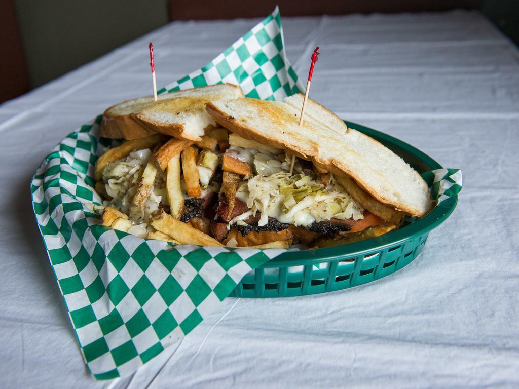 The Working Man's Yinzer Sandwich · Your choice of a generous portion of either capicola, pastrami, roast beef , turkey, ham, steak or bacon, egg and cheese. Topped with fresh homemade fries, coleslaw, provolone cheese and tomato. Grilled to perfection and piled high on fresh baked italian bread . Get it toasted or untoasted.
