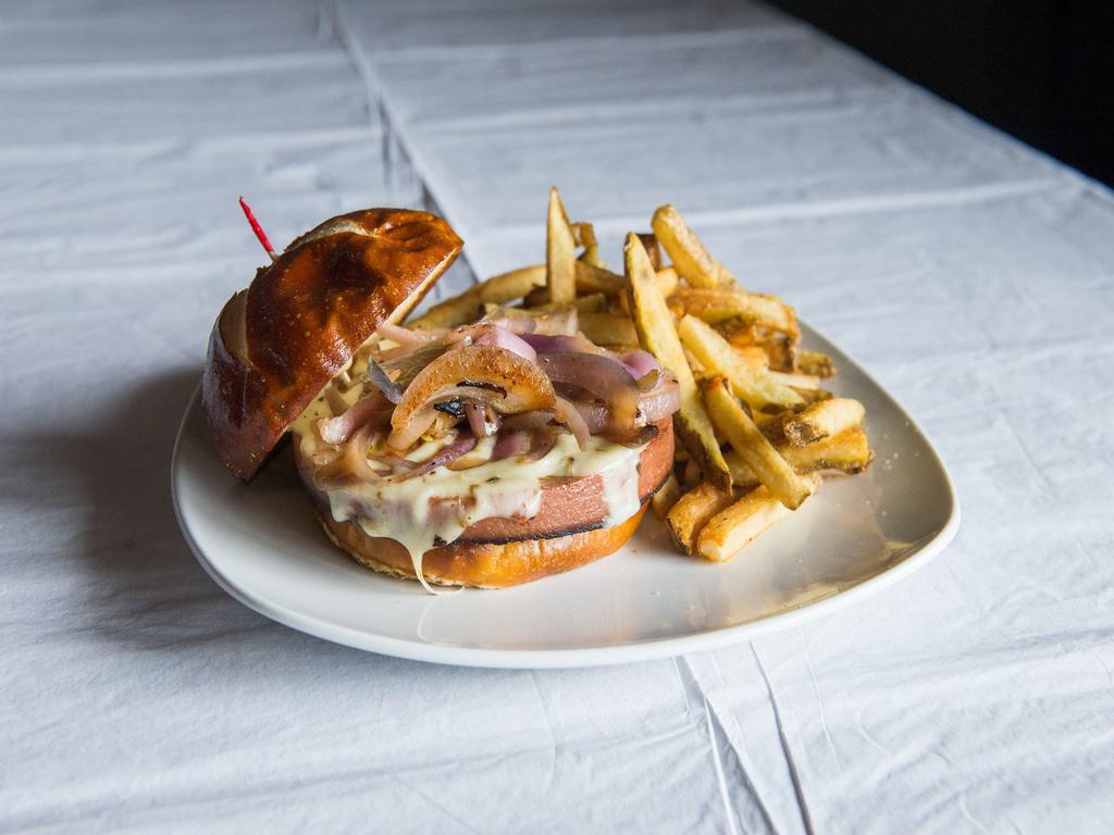 Fried Bologna Sandwich · Thick sliced Bologna, topped with pepper jack cheese, sauteed onions and piled high on a pretzel bun.