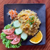 Shrimp Pork Fried Rice ·  Golden fried rice with pieces of shrimp, pork, eggs, and green onion served with pickled ca...
