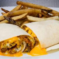 The Breakfast Wrap · Scrambled eggs, bacon, chili, onions and cheddar mix. Served with herb roasted potatoes or f...