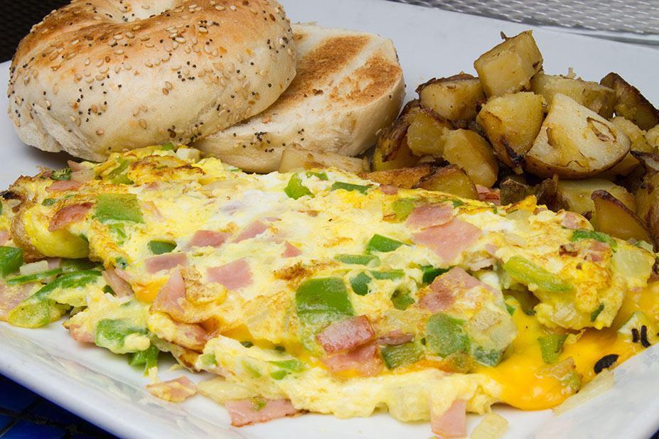 3 Item Omelette · Prepared with 3  eggs and served with toast.