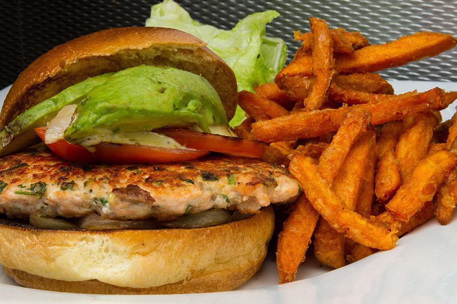 Salmon Burger · Fresh ground salmon and avocado. Make it deluxe for an additional charge.
