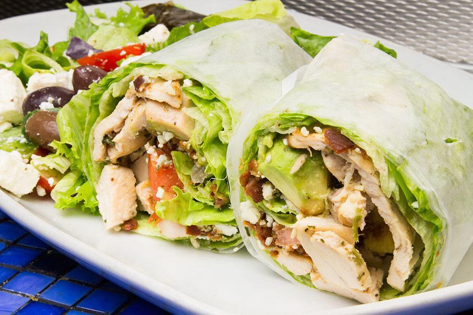 Lettuce Wrap · Stuffed with grilled chicken, avocado, bacon, tomato and blue cheese.