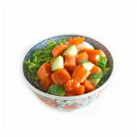Salmon Poke · Salmon, seaweed salad, cucumber, and masago. With the choice of sauce yuzu Japanese citrus s...