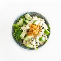 Tofu Poke  (V) · Tofu, fried bean curd, seaweed salad, and cucumber. Served with the choice of sauce yuzu Jap...