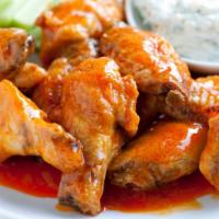 10 Piece Wings · Delicious chicken wings tossed in your choice of any housemade wing sauce or naked, served w...