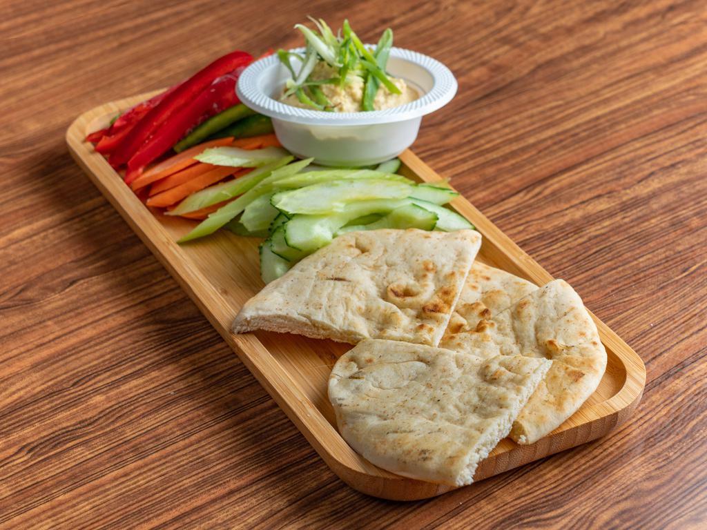 Hummus Platter · Served with pita and assorted veggies.