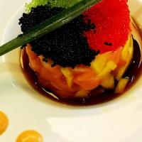 Salmon Toro Tartar · Diced with mango, black caviar and honey wasabi sauce.